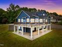 Two-story home with large deck and backyard at 5121 Watkinsdale Ave, Raleigh, NC 27613