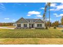 Craftsman style home with a large front yard at 30 Barham Mill Pond Ln, Wendell, NC 27591