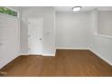 Bright foyer with hardwood floors and neutral walls at 320 Gilman Ln # 110, Raleigh, NC 27610