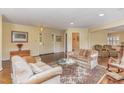 Spacious living room featuring hardwood floors and ample seating at 8450 Perry Rd, Graham, NC 27253