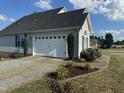 House exterior with attached garage at 970 Southern High School Rd, Graham, NC 27253