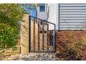 Stylish modern gate leading to the backyard at 617 Tower St, Raleigh, NC 27607