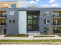 Contemporary apartment building's exterior and entrance at 29 Enterprise St # 209, Raleigh, NC 27607