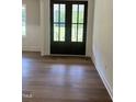 Hardwood floors in the entryway at 200 Whistlers Cv, Louisburg, NC 27549