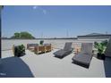 Rooftop deck with lounge chairs and seating area at 624 Market Grove Dr # 200, Wake Forest, NC 27587