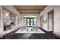Common area with seating and views to backyard at 2049 Abbeyhill Dr, Raleigh, NC 27610