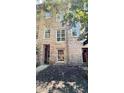 Stone building exterior with multiple windows and entrance at 1500 River Mill Drive Dr # 110, Wake Forest, NC 27587