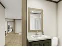 Clean bathroom with vanity, mirror, and shower at 369 Sombrero Ln, Henderson, NC 27537