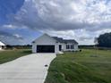 Newly built single story home with attached garage and large yard at 117 Grace Ridge Ct, Benson, NC 27504