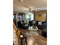 Spacious living room with dark wood floors and fireplace at 506 Averasboro Dr, Clayton, NC 27520