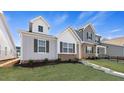 Modern two-story home with gray and white siding at 795 Washington St, Fuquay Varina, NC 27526