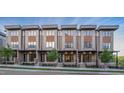 Modern townhome exteriors with brick and metal accents at 779 Willard St, Durham, NC 27701