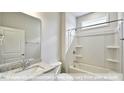 Bathroom with shower/tub combo, granite countertop vanity at 1677 Abberly Pl, Graham, NC 27253