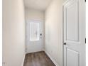 Bright foyer with wood flooring and white doors at 800 Dorset Stream Dr, Fuquay Varina, NC 27526