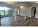 Bright dining room with hardwood floors and access to the kitchen at 90 Watermelon Dr, Franklinton, NC 27525