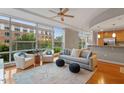 Spacious living room with hardwood floors, large windows, and comfy seating at 3201 Environ Way # Bldg 3000, Chapel Hill, NC 27517