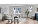 Spacious living room with a fireplace and hardwood floors at 6402 Tanner Oak Ln, Raleigh, NC 27613