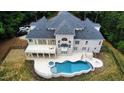 Luxury home with pool, spa, and expansive deck at 5200 Blue Stem Ct, Raleigh, NC 27606