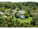 Aerial view showing house, pool, and large backyard at 2517 Oakes Plantation Dr, Raleigh, NC 27610