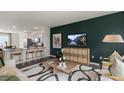 Open living space with a stylish TV console and comfortable seating at 752 Dorset Stream Dr, Fuquay Varina, NC 27526