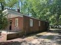 Brick house with a covered porch and driveway at 1222 Hargrove St, Rocky Mount, NC 27801