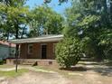 Brick house with a front porch and landscaping at 1222 Hargrove St, Rocky Mount, NC 27801