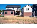 Two-story house back with a deck, additional building, and large yard at 508 East End Ave, Durham, NC 27703