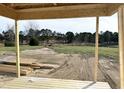 View from a partially built porch overlooking a golf course at 674 Barbour Farm Ln, Four Oaks, NC 27524