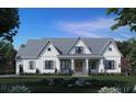 Modern farmhouse exterior with gray siding and metal roof at Lot 3 Roberson Creek Rd, Pittsboro, NC 27312