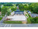 Aerial view of four-unit townhouses with ample parking at 98 Linda St, Princeton, NC 27569