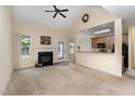 Living room with a fireplace and access to the backyard at 140 Applegate Dr, Franklinton, NC 27525