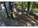 Wooded area surrounding home, partially cleared at 1612 Us 64, Apex, NC 27523