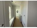 Bright hallway with built-in shelving and window at 289 Tobacco Barn Dr, Angier, NC 27501