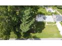 High-angle view of property with mature trees and clearing at 1304 Shade Tree Rd, Benson, NC 27504