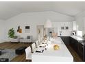 Open concept kitchen with large island and seating at 1304 Shade Tree Rd, Benson, NC 27504