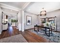 Spacious home office with hardwood floors and large windows at 2865 Silk Hope Gum Springs Rd, Pittsboro, NC 27312