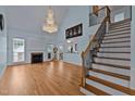 Bright living room with hardwood floors and fireplace at 19 Silverside Dr, Angier, NC 27501