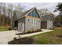 Modern home with gray siding and unique design at 1203 Keith Hills Rd, Lillington, NC 27546