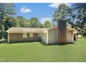 Brick ranch home with a patio and large backyard at 2400 Carbonton Rd, Sanford, NC 27330
