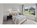 Cozy bedroom with large window and window seat at 2209 Fletchers Ridge Dr, Durham, NC 27703