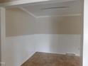 Bright dining area with white wainscoting and tile floor at 413 Columbia Avenue Ave, Burlington, NC 27217