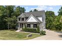 Two story house with stone accents and landscaping at 2517 Snyder Ln, Wake Forest, NC 27587