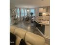 Open concept kitchen with island, granite counters, and breakfast area at 5011 Manderleigh Dr, Knightdale, NC 27545