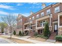 Townhome community with ample parking and landscaping at 836 Bankston Woods Way, Raleigh, NC 27609