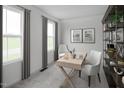 Bright home office space with built-in shelving and plenty of natural light at 290 Gianna Dr, Lillington, NC 27546