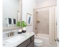 Bathroom with granite countertop, tub, and shower at 902 Sw Maynard Rd, Cary, NC 27511