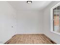 Spacious office featuring hardwood floors and large window at 46 Otter Hole Dr, Princeton, NC 27569