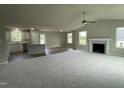 Spacious living room with high ceilings and a fireplace at 749 Sherrill Farm Dr, Benson, NC 27504
