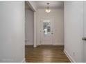 Bright entryway with hardwood floors and a white front door at 0 Sawmill, Cedar Grove, NC 27231