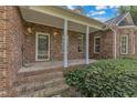 Brick porch with white columns and landscaping at 1100 Branch Chapel Church Rd, Selma, NC 27576